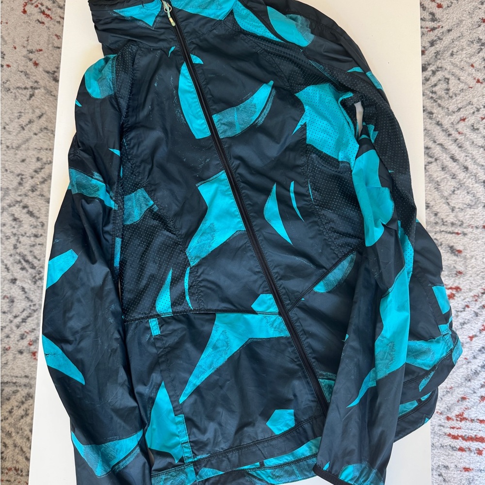 Lulu Lemon rain jacket with hidden hood